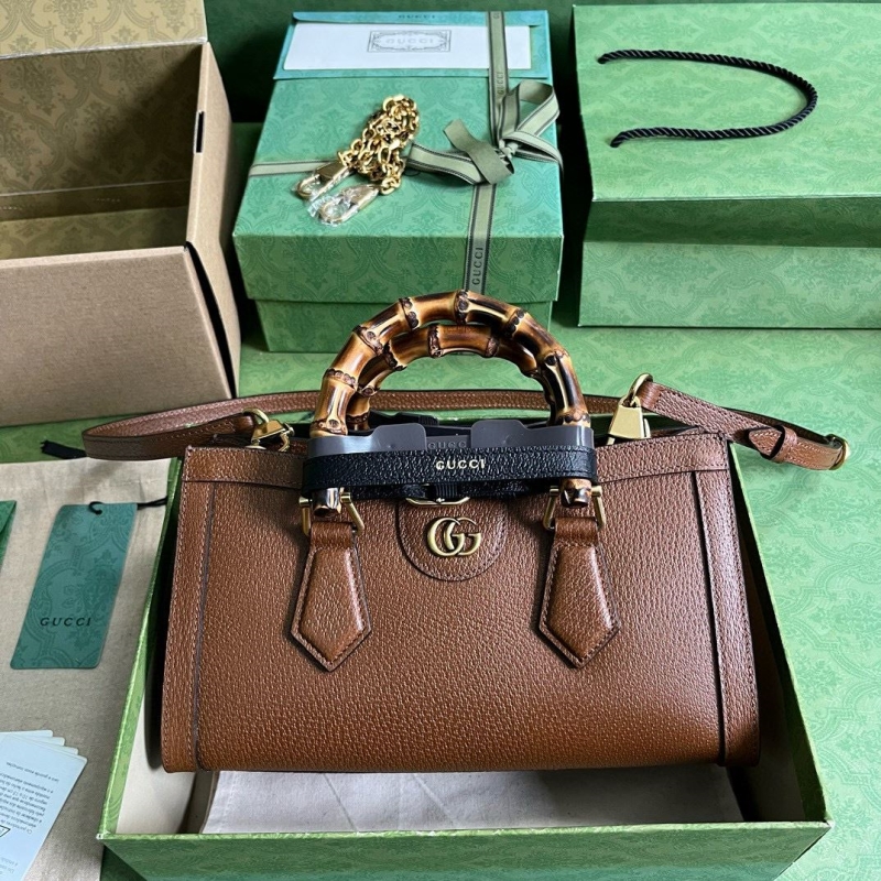 G*u*i top handle bags